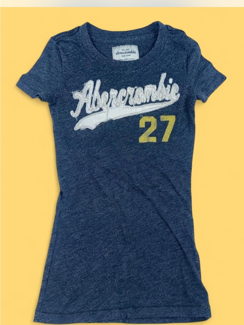 Abercrombie & Fitch Navy Blue Graphic Tee with Yellow Accent